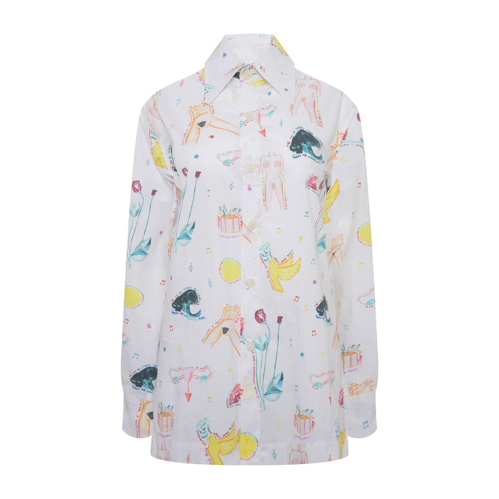 Camisa feminina 'Bossolan' Oração da Alix em tricoline 100% algodão. Estampa colorida sobre fundo branco, ideal para composições criativas na moda brasileira.