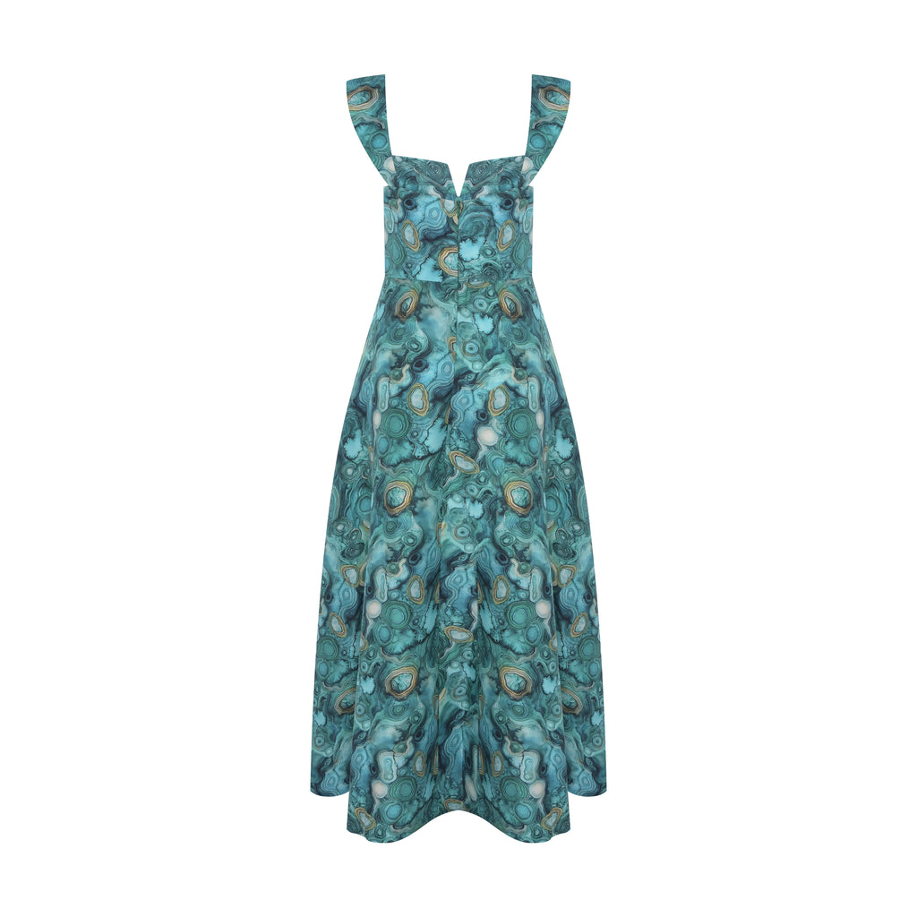 Vista traseira do Vestido Lia Malaquita Verde feito em seda pura com amarrações nos ombros e acabamento artesanal.