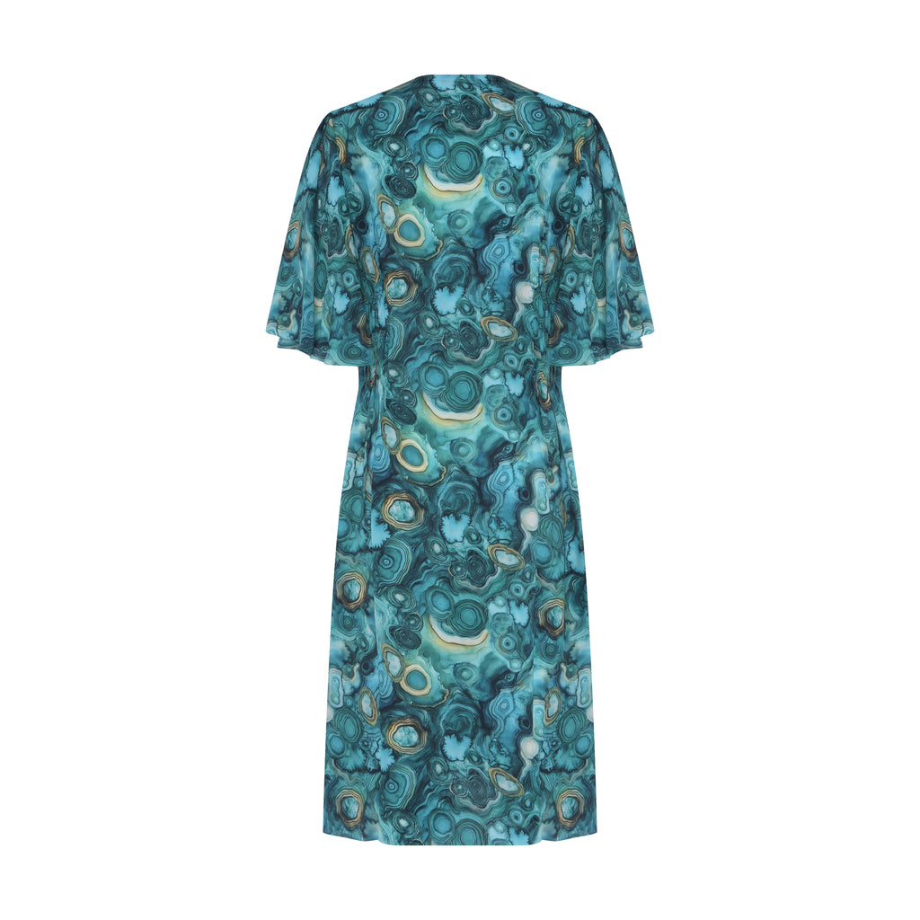 Verso do Vestido Marta Malaquita em Chine Due, estampa artística multicolorida com fundo verde e silhueta ampla e leve.